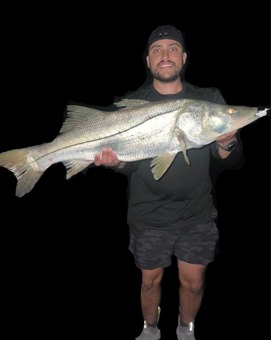 Oversized snook caught on R&R Tackle soft plastic shrimp jig – proven inshore lure for trophy snook fishing in Florida