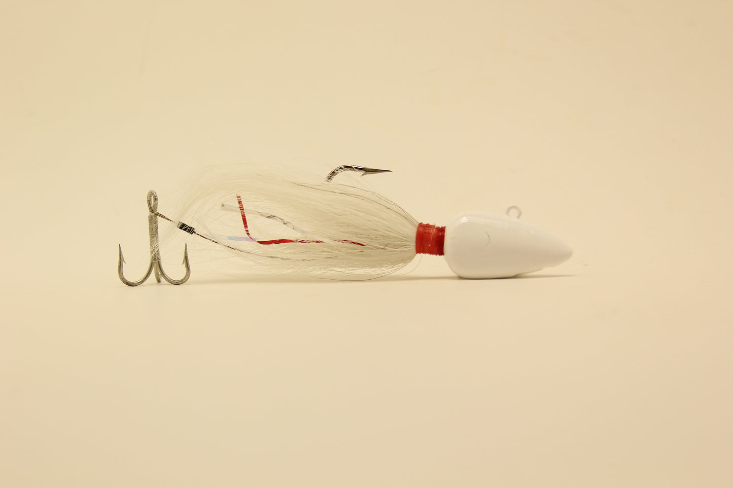 White Buck tails, grouper jigs, saltwater lures, Flair Hawks.
